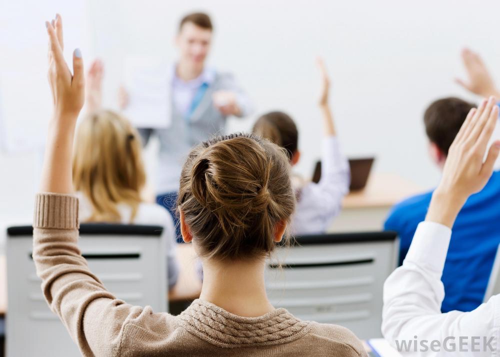 hands-raised-in-classroom